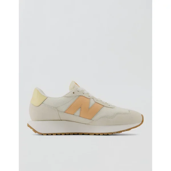 New Balance Women's 237 Sneaker - Peach